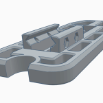 3D model of a gray plastic component with various cutouts and a central mounting feature.