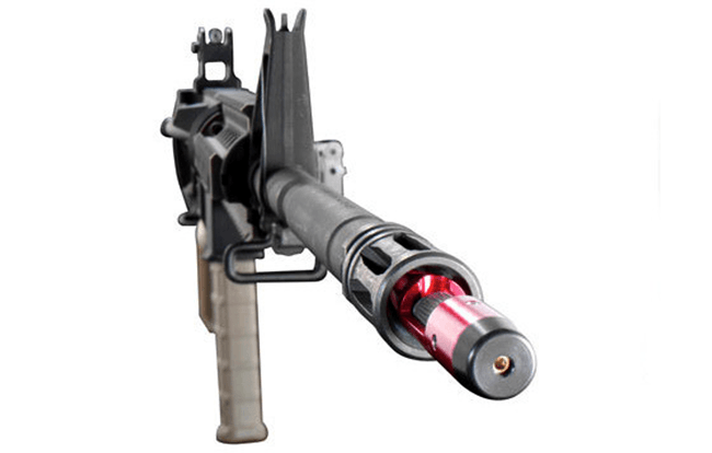 LaserLyte bore sight attached to a firearm, showcasing the red laser alignment feature.
