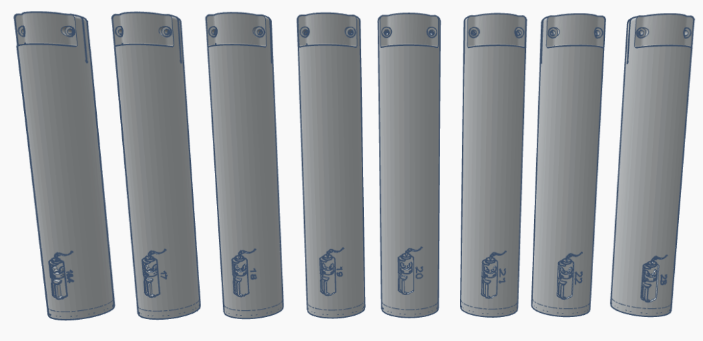 Series of cylindrical objects with a design resembling a fire extinguisher on each one, arranged in a row.
